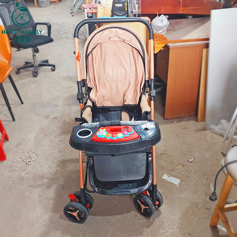 xe-day-em-be-cu-2 Xe Đẩy Em Bé Cũ Màu Cam Thiết Kế Hiện Đại