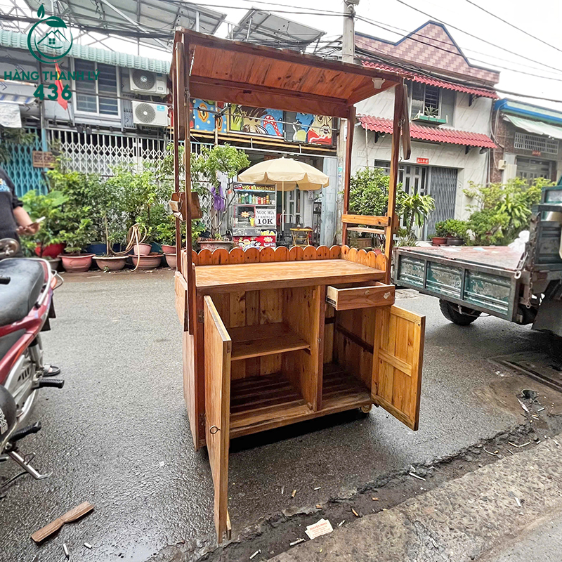 xe-ban-hang-cu-bang-go-co-banh-xe-va-ngan-tu-kin-1 Xe Bán Hàng Cũ Bằng Gỗ Có Bánh Xe Và Ngăn Tủ Kín