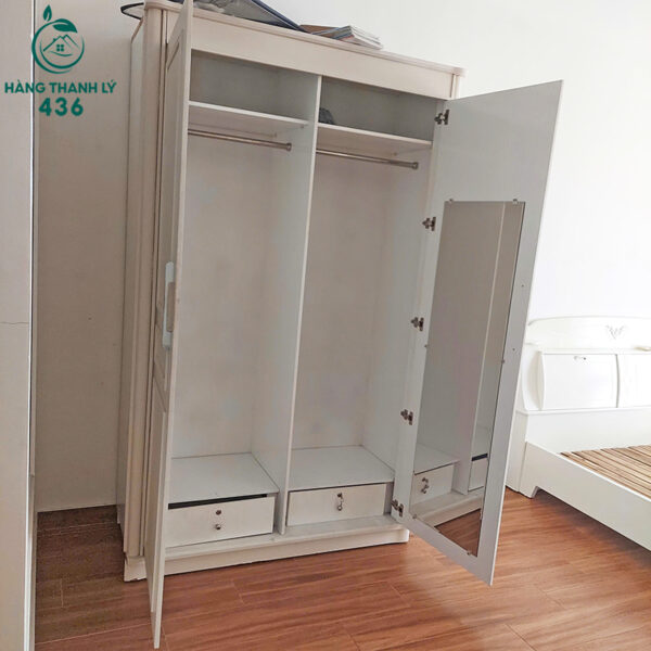 tu quan ao 2 canh cu 1m4x2m3 gan guong ben trong 1