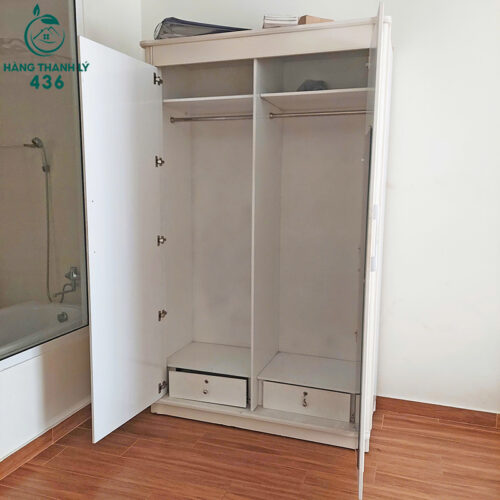 tu quan ao 2 canh cu 1m4x2m3 gan guong ben trong 2