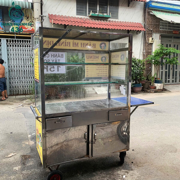 quay-ban-hang-cu-khung-kim-loai-co-banh-xe-tien-di-chuyen (3) quay ban hang cu khung kim loai co banh xe tien di chuyen 3