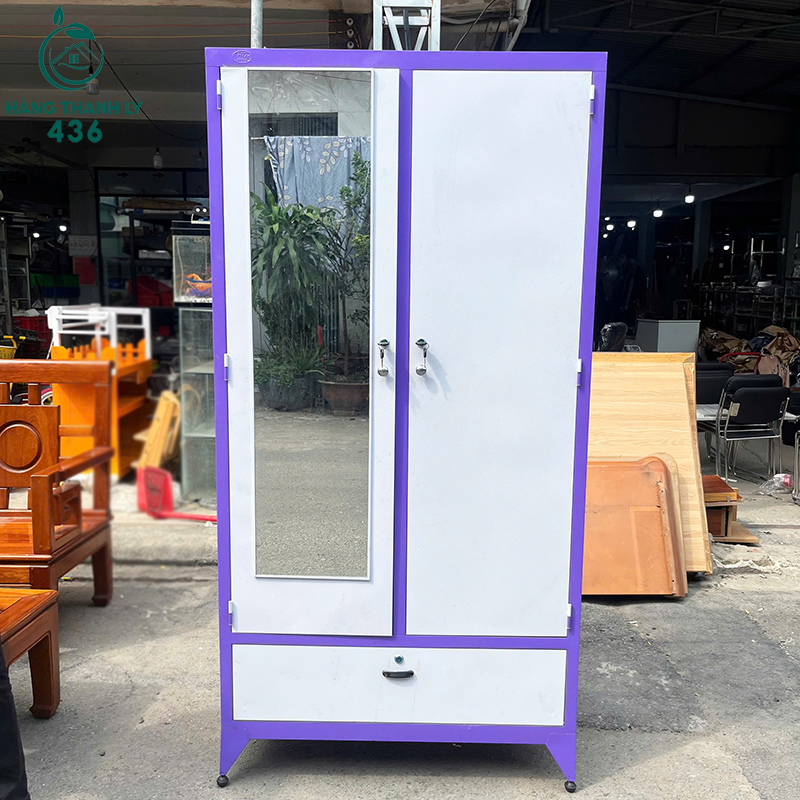 tu-sat-quan-ao-cu-1m8x90cm-2-canh-co-guong-to-mau-tim-phoi-trang-1 Tủ Sắt Quần Áo Cũ 1M8X90CM 2 Cánh Có Gương Màu Tím Phối Trắng