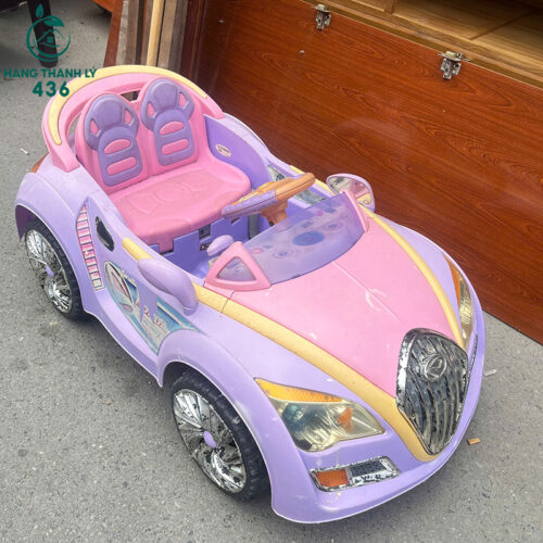 Xe Ô Tô Điện Trẻ Em Cũ 2 Chỗ Ngồi Màu Hồng Tím Cá Tính 4 xe o to dien tre em cu 2 cho ngoi mau hong tim ca tinh 1