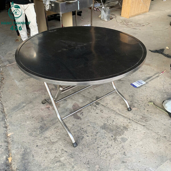 ban tron inox cu 1m2x75cm chan gap tien di chuyen 2