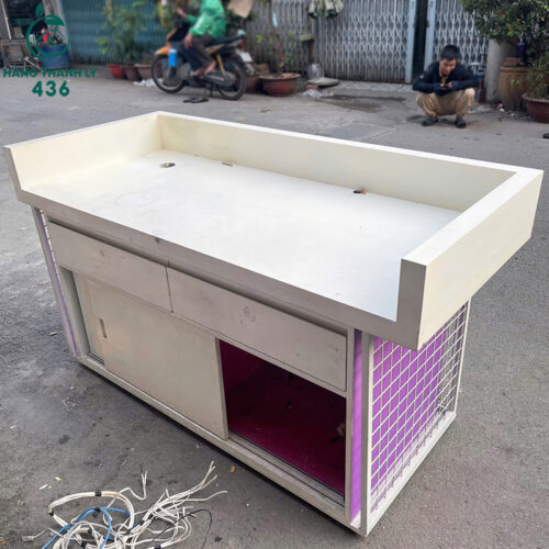 quay-thu-ngan-cu-1m6x70cmx90cm-thiet-ke-phoi-mau-trang-tim-4-500x500 Thanh Lý Bàn Ghế Cũ, Mua Bán Đồ Nội Thất Cũ Giá Rẻ TPHCM