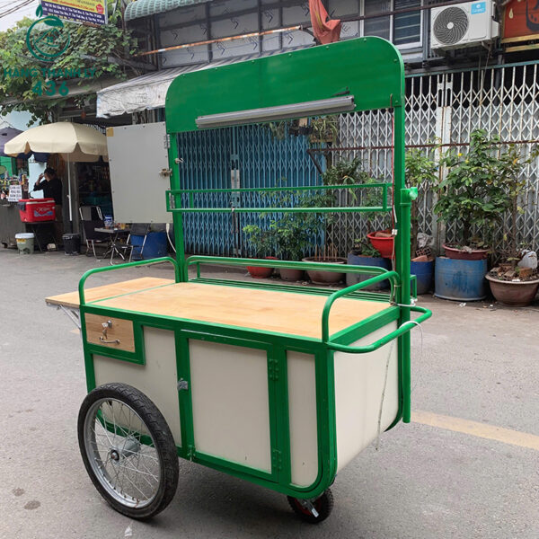 xe-day-ban-hang-cu-1m6-x-72cm-x-1m8-khung-sat-son-xanh-chac-chan (1) xe day ban hang cu 1m6 x 72cm x 1m8 khung sat son xanh chac chan 1