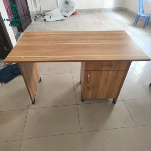 ban lam viec cu 1m2x60cmx75cm go mau sang co hoc 1