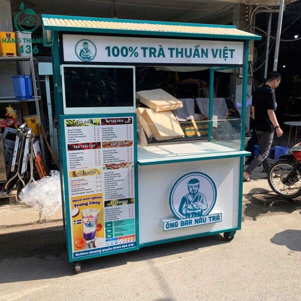 xe ban tra sua cu 1m67x65cmx2m mau xanh khung sat co mai che 1