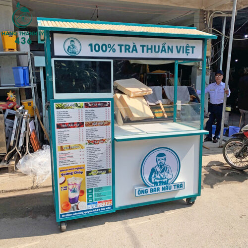 xe ban tra sua cu 1m67x65cmx2m mau xanh khung sat co mai che 2