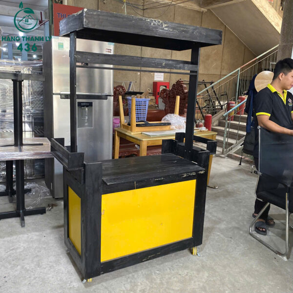 xe day ban hang cu 1m8x1m2x77cm go mau den phoi vang 2