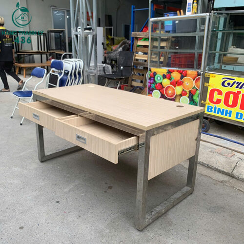 ban lam viec cu 1m4x70cm khung inox co 2 hoc keo 3