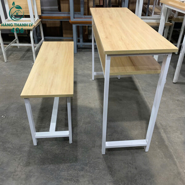 bo ban ghe hoc sinh cu 1m1x40cm khung sat mau trang 1