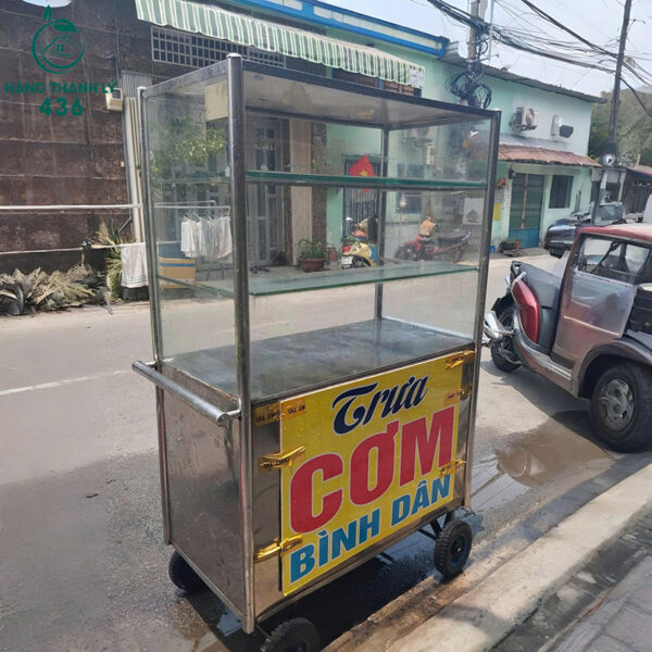 xe day ban com cu khung inox kem tu kinh