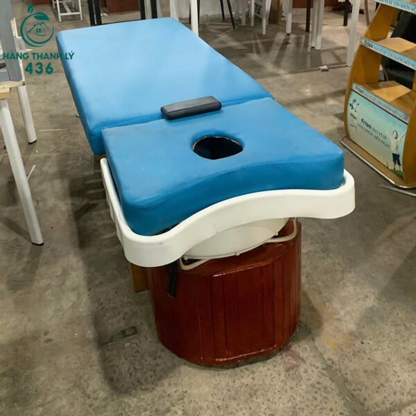 giuong massage cu boc da mau xanh khung go 6